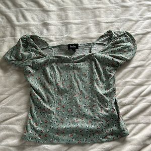 green floral semi cropped shirt